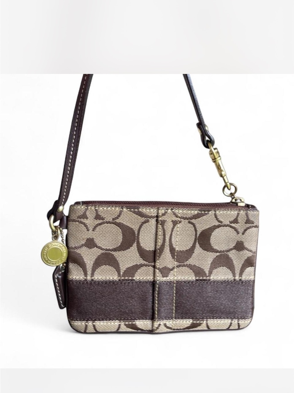 Coach Signature legacy lined Canvas Wristlet in Brown